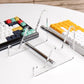 Transparent acrylic keyboard stand holding colorful keycaps on two tiers