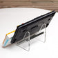 Transparent acrylic keyboard stand angled with black plate and chrome support rods