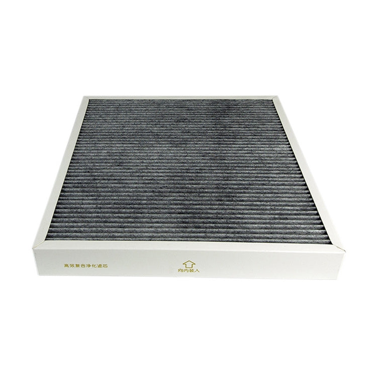 Air purifier filter element with dark gray textured surface inside white tray