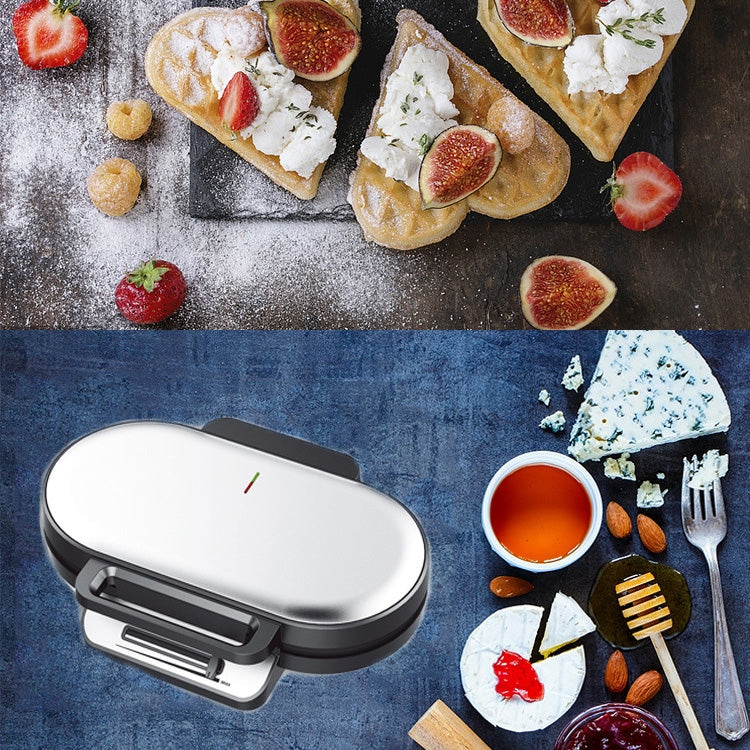 Mini electric waffle maker with closed lid and handle, designed for grid waffles