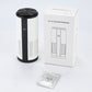 White cylindrical air purifier with black accents and included filter box