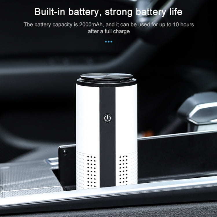 White and black cylindrical car air purifier with power button and vent holes