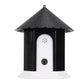 Outdoor bark control training house, front panel with speaker grille and circular sensor