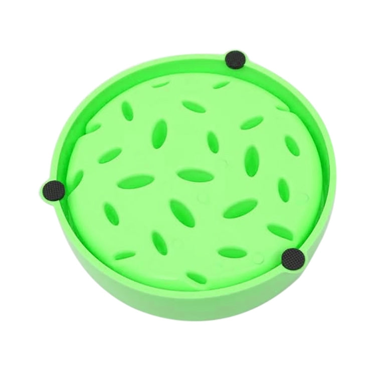 Green round pet food bowl lid-style top with pebble-like nubs