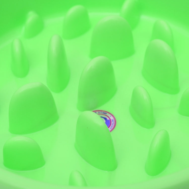 Close-up of green anti-choking bowl interior with raised feeder nubs