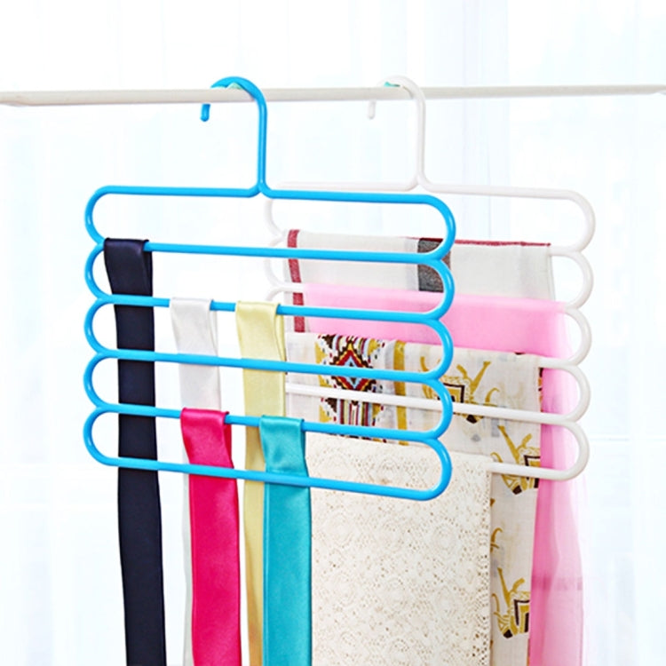 Blue and white 5-layer plastic hangers holding folded scarves and pants