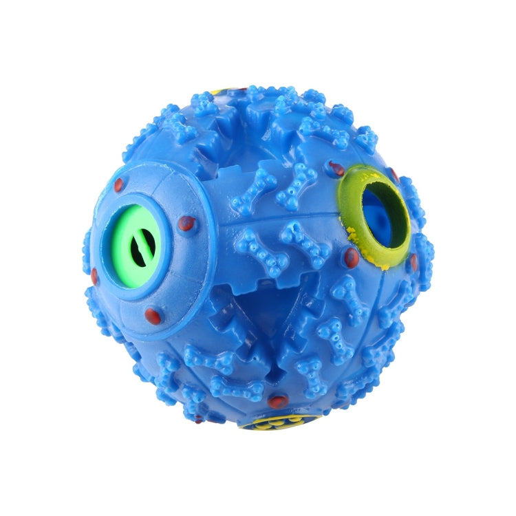 Blue bumpy chew ball with textured grip dots and two colored round openings