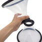 Hand opening the round bottom lid of a clear gravity coin funnel