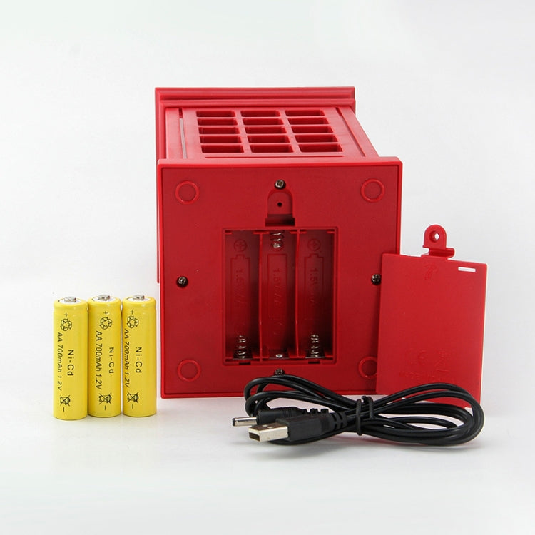 Red phone booth lamp back panel with battery compartment and charging cable, on display.