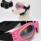 Pink dog foldable sunglasses with rainbow lenses and black adjustable strap, close-up