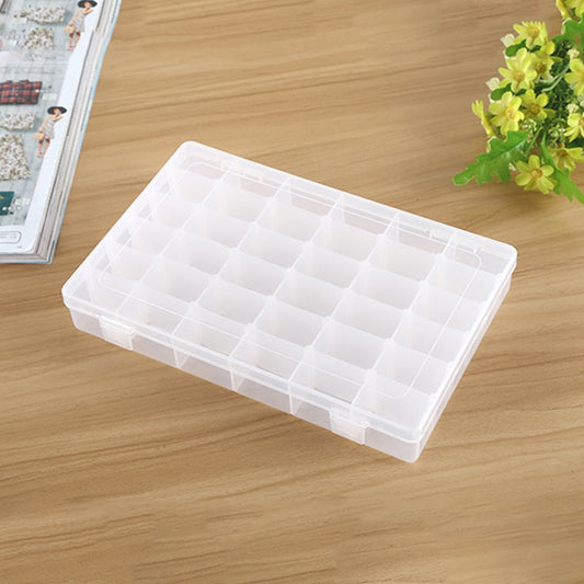 Clear plastic jewelry organizer box with removable grid and 36 compartments