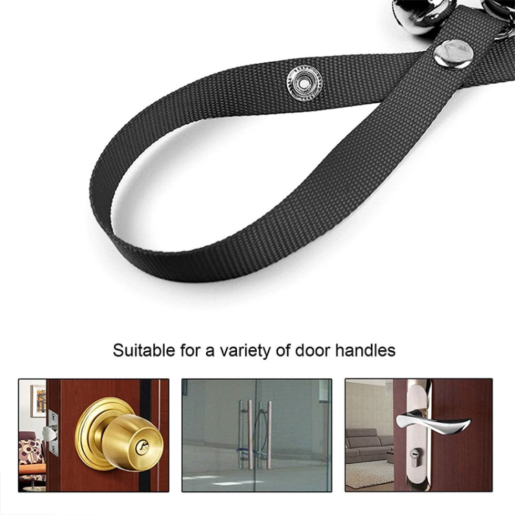 Black nylon dog doorbell leash strap with silver bell connectors and loop fastener