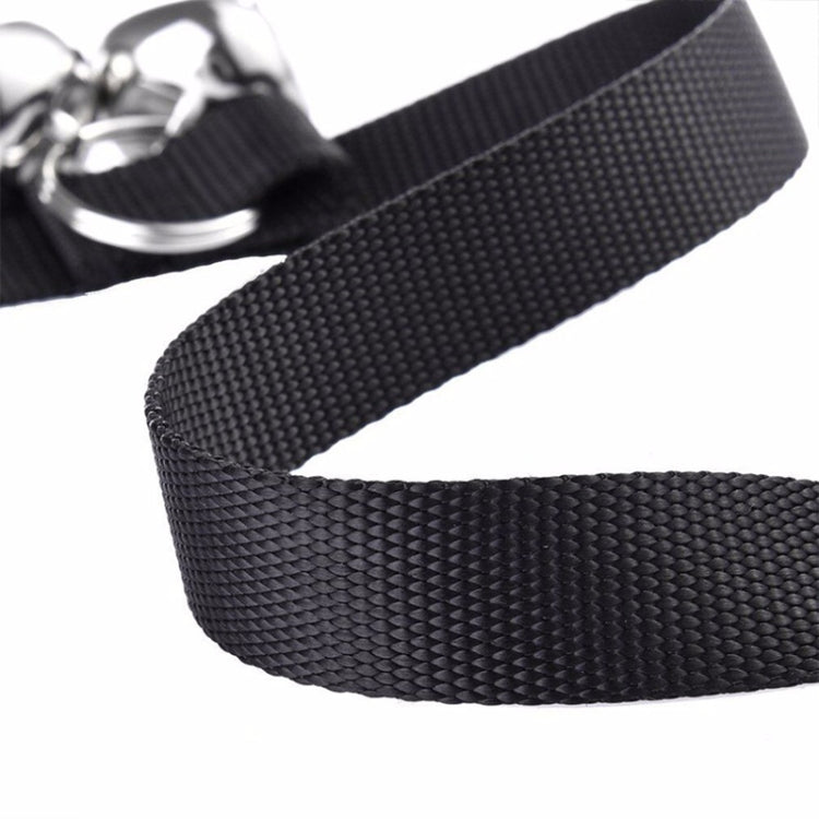 Black nylon traction strap with silver bell cluster connector for dog doorbell