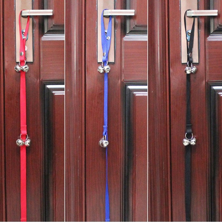Colorful dog doorbell leash straps with silver bells hanging on door handles