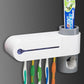 Automatic toothpaste dispenser with toothbrush holder and cup for toothpaste tube, mounted