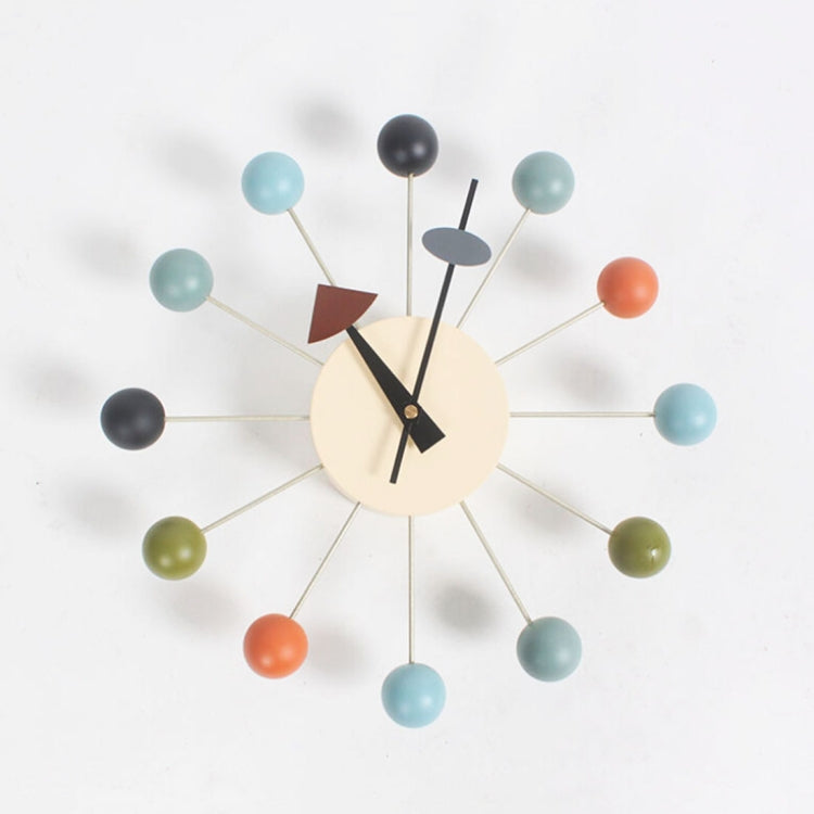 Wall clock with pastel blue ball arms, cream face, black hands and black clock marker
