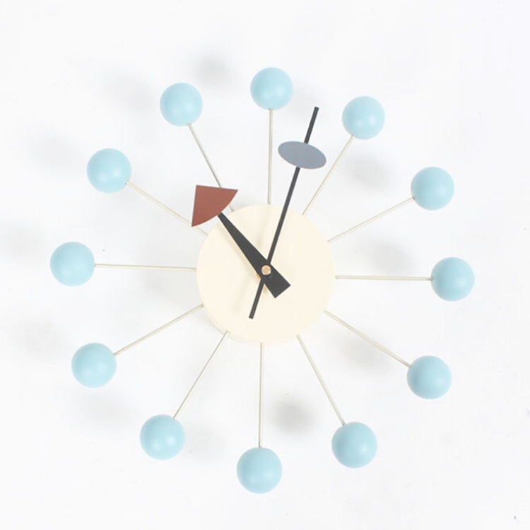 Wall clock with light blue ball arms, cream face, black hands and triangular accents