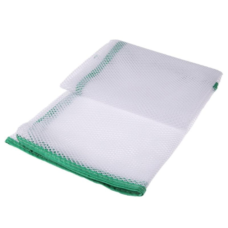 Balcony stair safety net, white mesh with green edge, folded