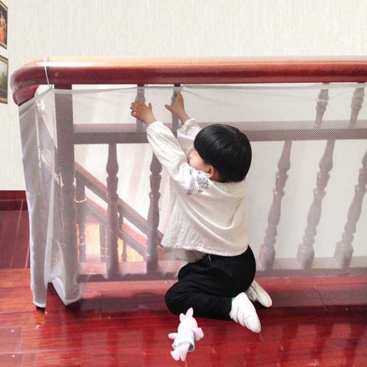 Balcony stair safety net installed on railing, white mesh with side edge
