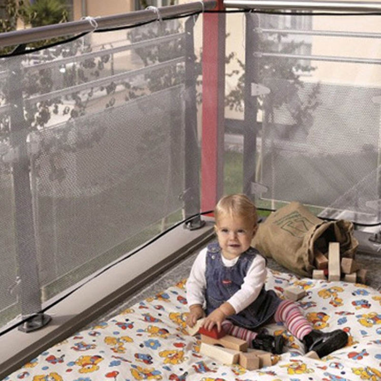 Balcony stair safety net installed along balcony railing, white mesh