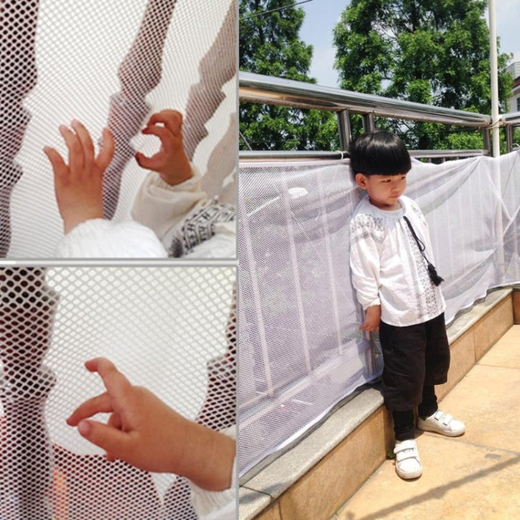 Balcony stair safety net installed on railing, white mesh for child safety
