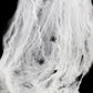 White cotton spider web yarn with two small black spiders