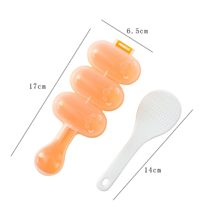 Orange spoon-shaped sushi rice ball mold with three rounded compartments and paddle