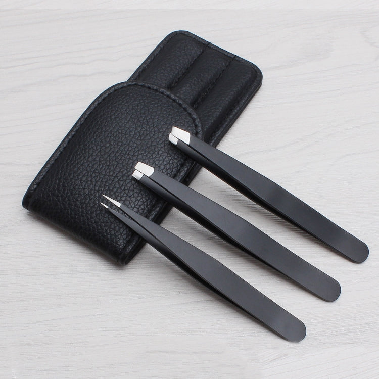 Three black eyebrow scissors with stainless tips stored in a black faux-leather case