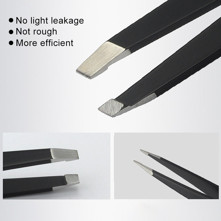 Close-up of two stainless eyebrow scissor tips with black handles