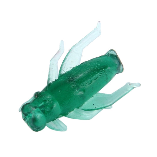 Green translucent cricket-shaped fishing lure, angled side view