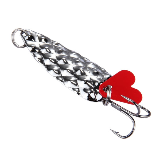 Metallic silver fish lure with black patterning, red fins, and treble hooks