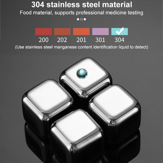 Four reusable stainless steel ice cubes with smooth mirror-finish surfaces