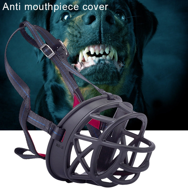 Black dog muzzle on a dog face with padded strap and red inner ring
