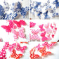 Butterfly wall sticker set with blue, pink, and red polka-dot butterflies in clusters