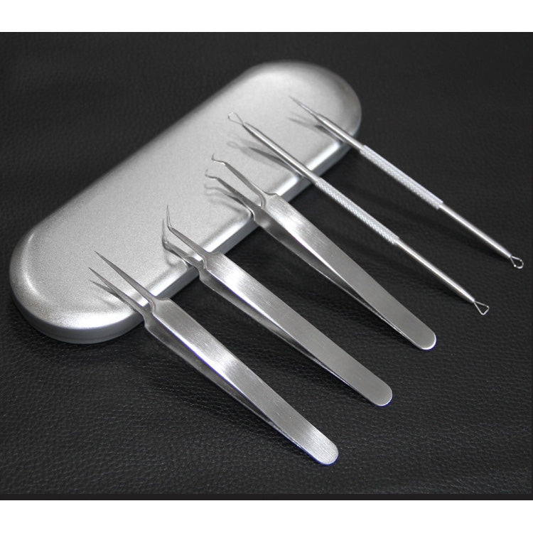 Acne pimple extractor tool set with four stainless needles on metal handles