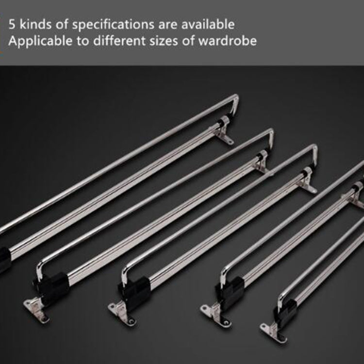 Set of telescopic wardrobe clothes rails with black end caps on display