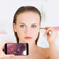 Pink ear endoscope tool held near a woman’s ear with phone showing live view