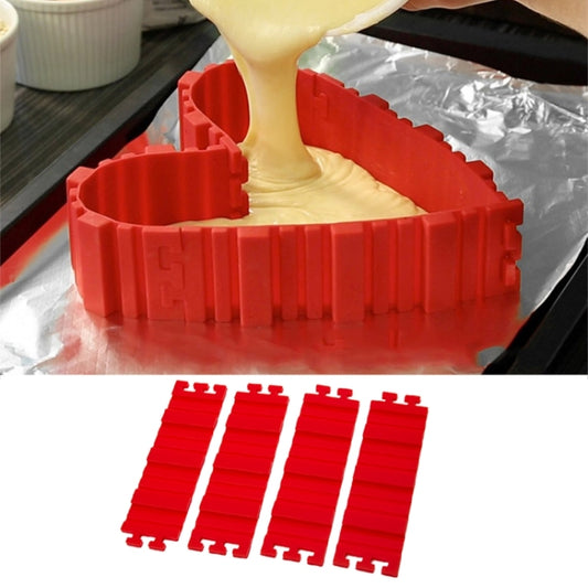 Red silicone cake mold ring with cutout sections, filled with batter during pouring
