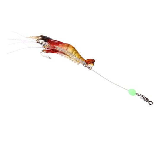 Shrimp-shaped fishing lure on line with hook, red-yellow body, long tail fibers