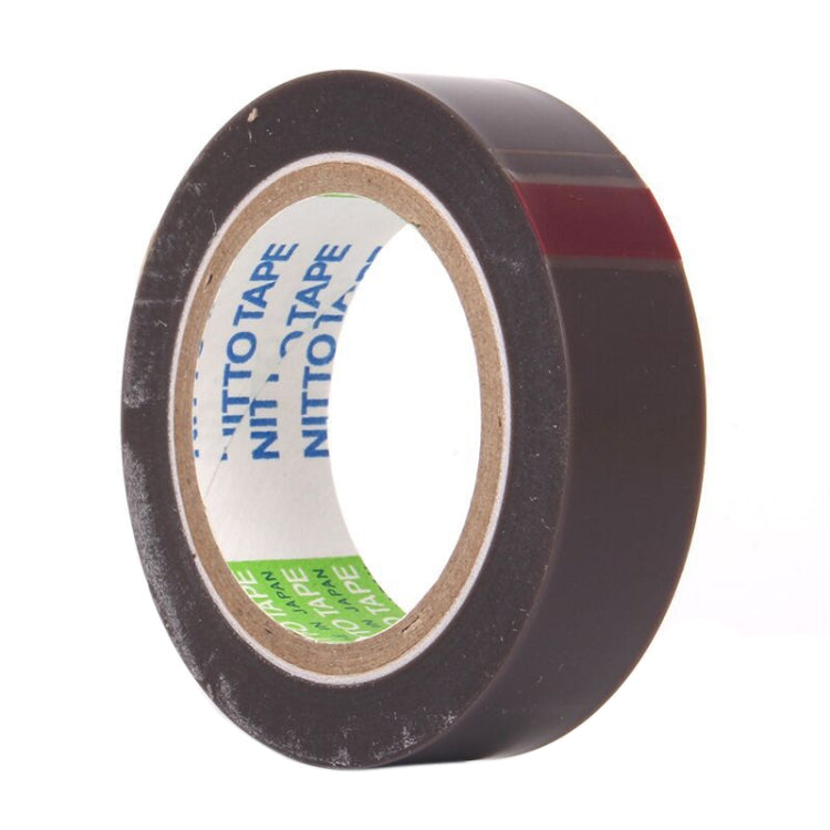 Black high-temperature Teflon sealing tape roll with red side stripe; NITTO TAPE on core