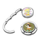 Chrome folding bag hanger with round base and hook clip, colorful disc insert
