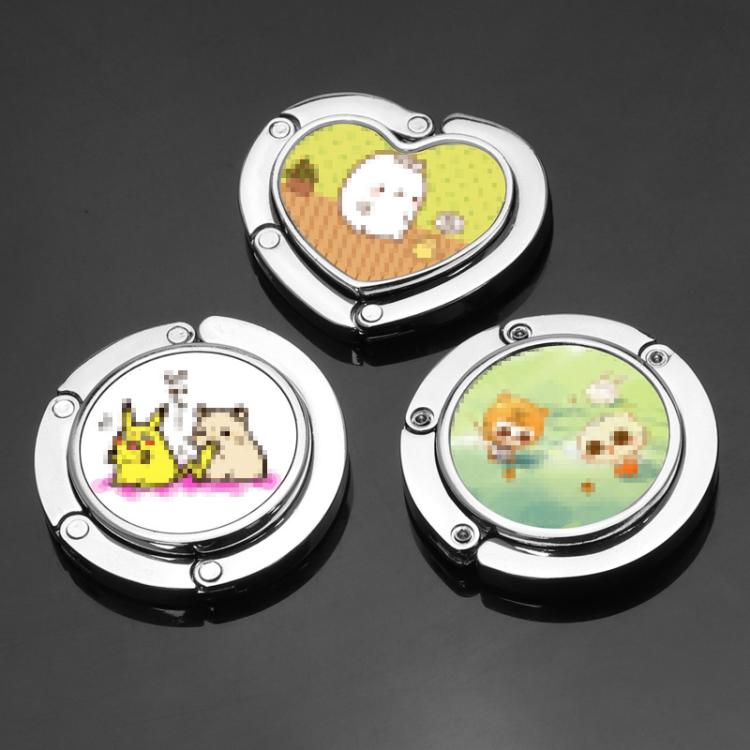 Round folding bag hangers with chrome frames and colorful heart-pattern disc covers