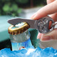Skull bottle opener key chain held against bottle cap, key ring visible