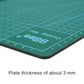 Close-up of A4 cutting mat corner with logo, dotted scale, and thick black edge