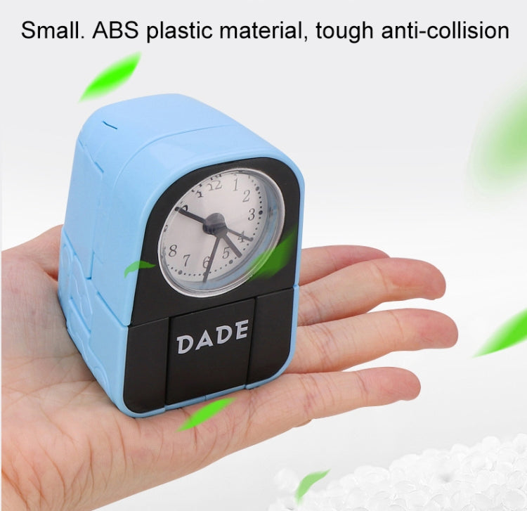 Blue robot alarm clock toy held in hand, round dial and Dade logo on front