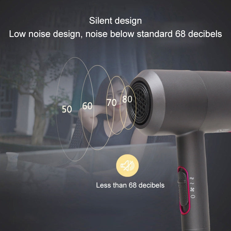 Grey hair dryer with rear air vent opening, low-noise design graphic