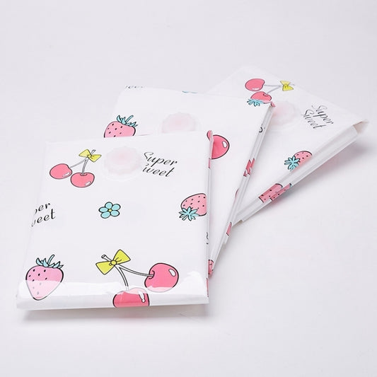 Four white vacuum storage bags with cute fruit, flower, and bird pattern