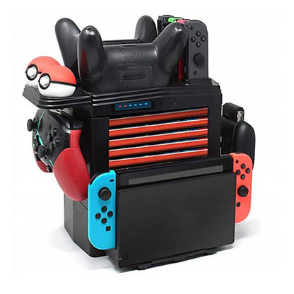 Game charging base stand with dual controller grips and red/blue Joy-Con holders