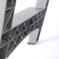 Close-up of gray ladder steps and support frame with cross-bracing