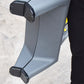 Close-up of gray ladder foot pads and side hinge for folding step stool